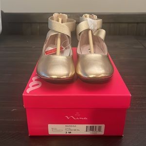 Brand new Nina shoes in size 2M. Gold “Marissa” ballet flats. All tags intact.